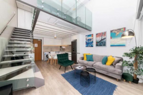 Plush Loft Apartment with Signal Hill View